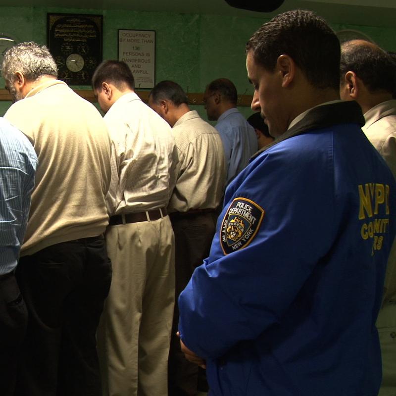Detective Nasser, praying during a Ramadan service